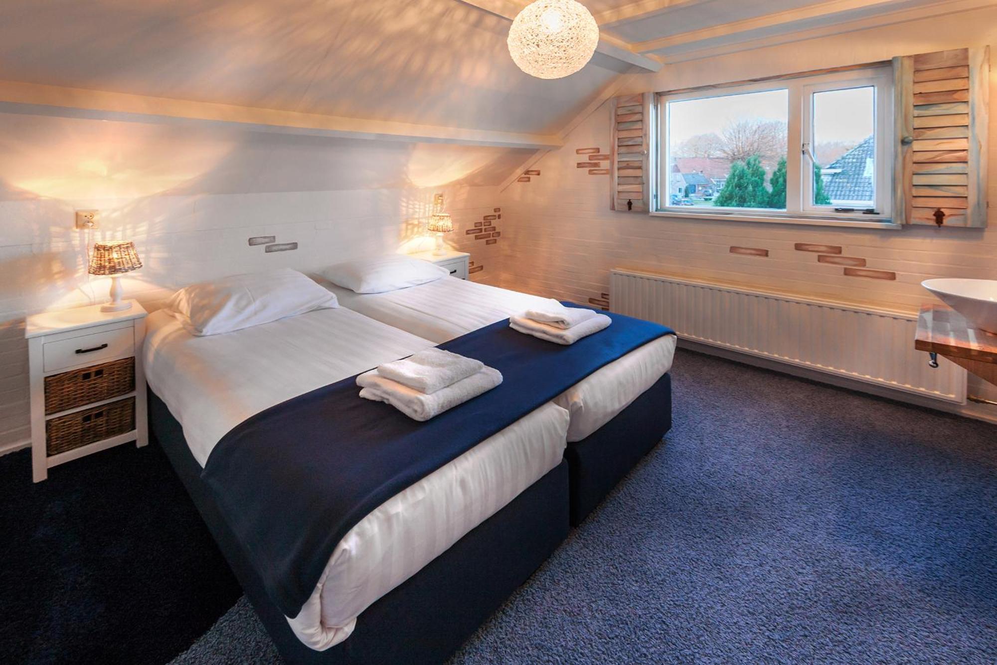 Hotel Hartlief Buinen Pokoj fotografie